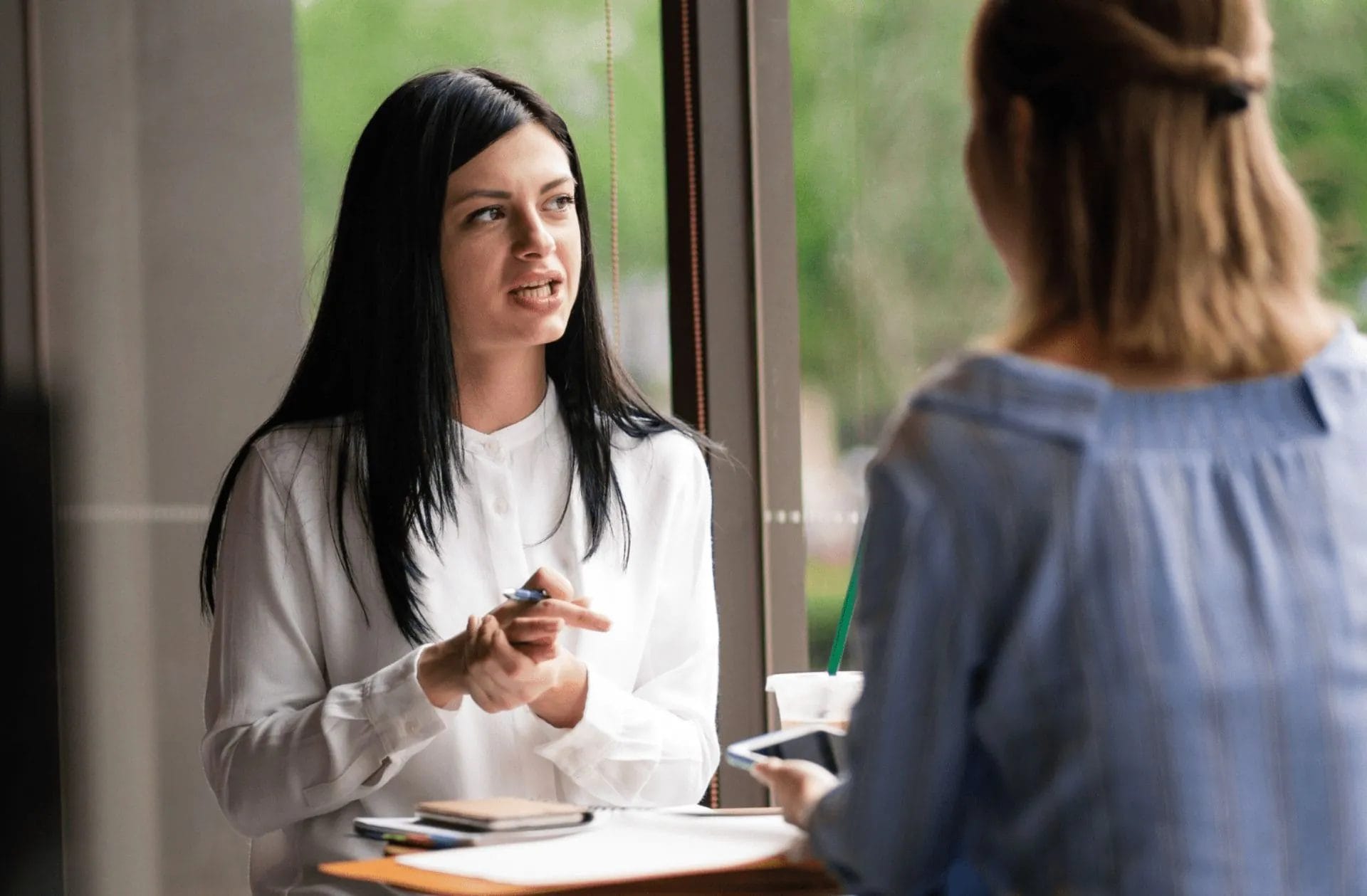 A woman interviewing someone