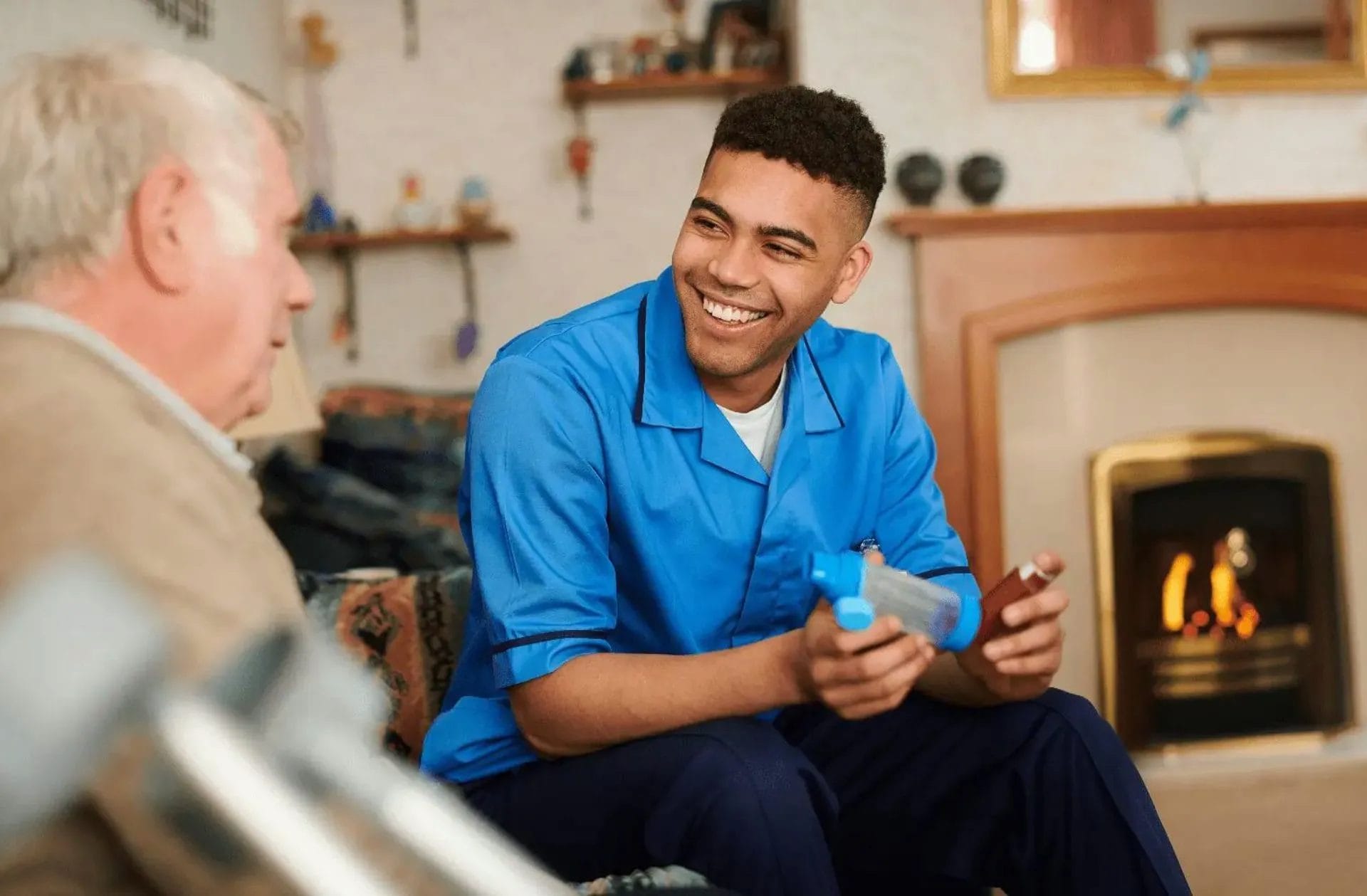 A nurse looking after and old man