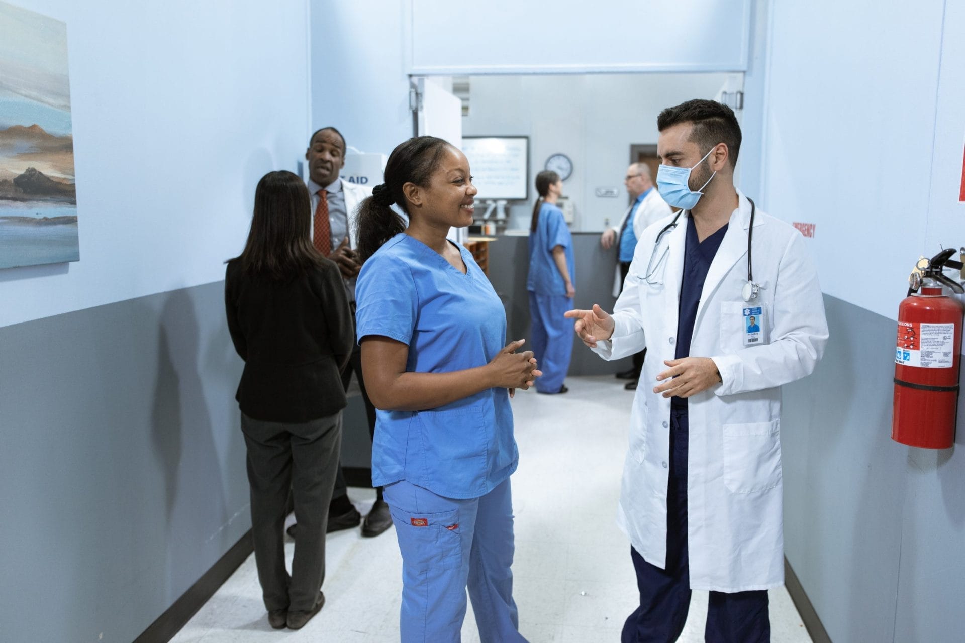 A nurse and a doctor talking