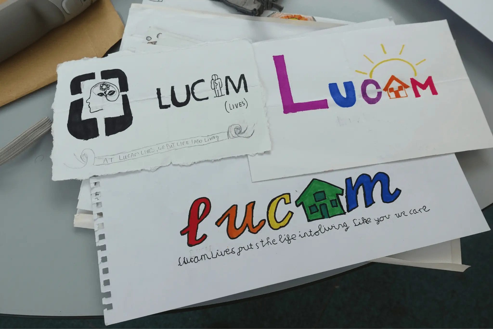 Lucam Lives Reveal New Logo Designed by Sutton Academy Students