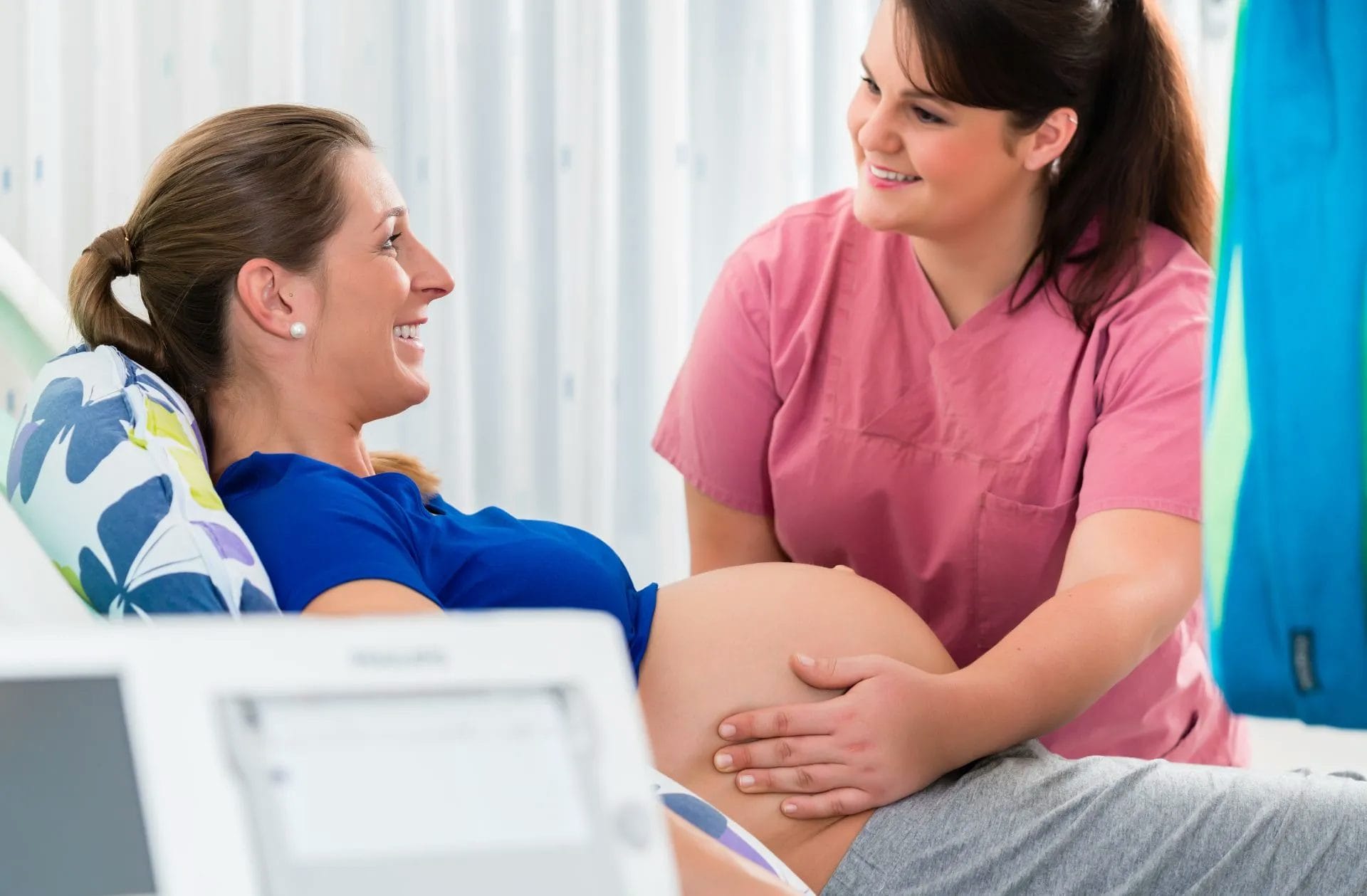 A midwife with a pregnant woman