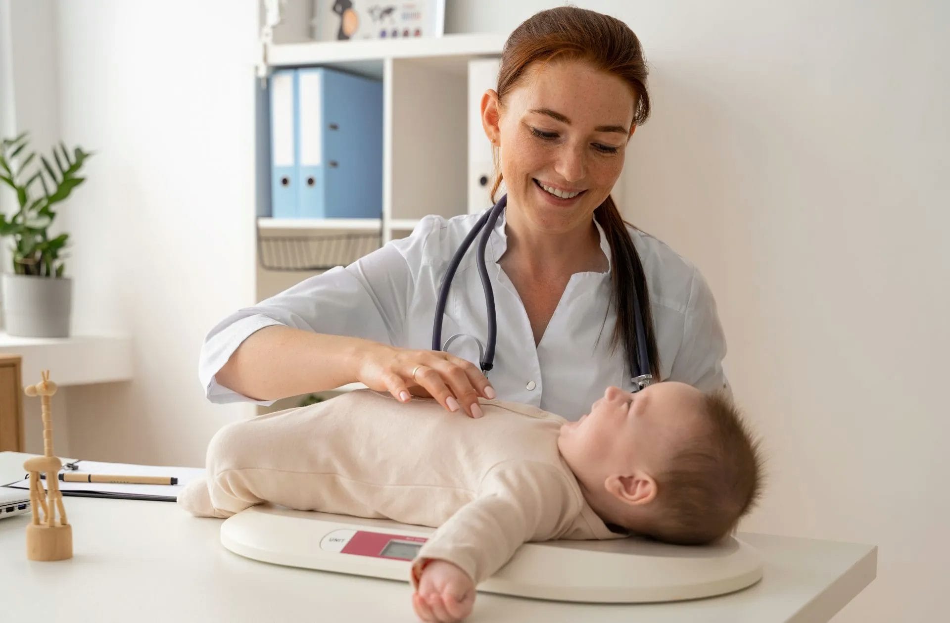 A midwife checking on a baby