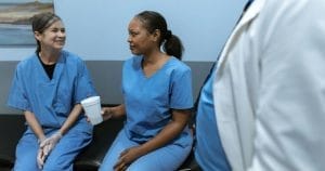 Two nurses talking to eachother